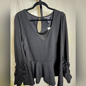 Peplum with Ruched Sleeves